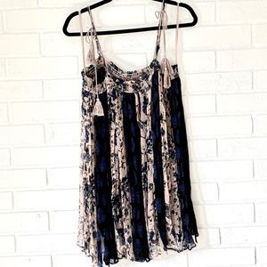 Free People babydoll dress in size small.
